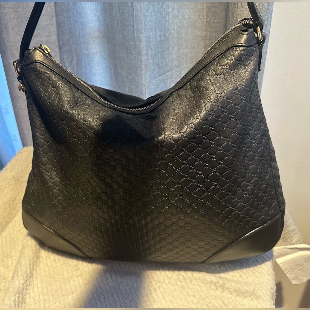 Gucci Black leather Guccissima print Bree bag
